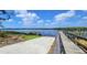 Community dock offering scenic river views and access to waterfront activities at 28976 Gin Ln, Punta Gorda, FL 33982
