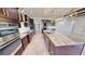 Gourmet kitchen with granite countertops and modern cabinetry at 28992 Gin Ln, Punta Gorda, FL 33982