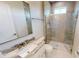 Clean bathroom with a single vanity, shower, and granite countertop at 28992 Gin Ln, Punta Gorda, FL 33982