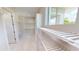 Bright walk-in closet with ample shelving and hanging space at 28992 Gin Ln, Punta Gorda, FL 33982