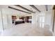 Spacious kitchen featuring an island, stainless steel appliances, and dark wood cabinets at 28992 Gin Ln, Punta Gorda, FL 33982