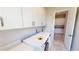 Spacious laundry room with ample cabinet space at 28992 Gin Ln, Punta Gorda, FL 33982