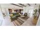 Open living room featuring hardwood floors and high ceilings at 28992 Gin Ln, Punta Gorda, FL 33982