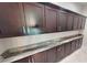 Modern pantry with ample cabinetry and granite countertops at 28992 Gin Ln, Punta Gorda, FL 33982