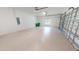 Large garage with epoxy floor and extra storage at 28992 Gin Ln, Punta Gorda, FL 33982