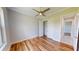 Bright bedroom with wood flooring and a large closet at 28992 Gin Ln, Punta Gorda, FL 33982