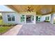 Covered patio offers access to backyard and kitchen at 28992 Gin Ln, Punta Gorda, FL 33982