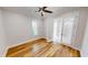 Bright bedroom with light wood flooring and french doors at 28992 Gin Ln, Punta Gorda, FL 33982