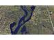 Aerial view showing home location near water at 28992 Gin Ln, Punta Gorda, FL 33982