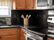 Kitchen corner with granite countertops and stainless steel appliances at 1191 Manor Rd, Englewood, FL 34223