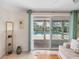 View of the pool from the living room at 1191 Manor Rd, Englewood, FL 34223