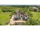 Luxury waterfront home with landscaped grounds and sunset view at 21321 Harborside Blvd, Port Charlotte, FL 33952