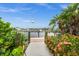 Wooden walkway leads to a dock with a view of the marina at 21321 Harborside Blvd, Port Charlotte, FL 33952