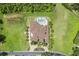 Luxury home with pool and expansive lawn, offering a desirable outdoor space at 21321 Harborside Blvd, Port Charlotte, FL 33952