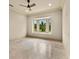 Spacious bedroom with a bay window and ceiling fan at 21321 Harborside Blvd, Port Charlotte, FL 33952