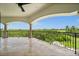 Balcony offering panoramic views of lush greenery, creating a serene outdoor retreat at 21321 Harborside Blvd, Port Charlotte, FL 33952