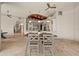 Spacious kitchen featuring modern appliances, a large island, and an adjacent dining area with seating for four at 21321 Harborside Blvd, Port Charlotte, FL 33952