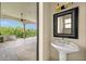 Convenient powder room with pedestal sink and outdoor access at 21321 Harborside Blvd, Port Charlotte, FL 33952