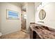 Luxurious bathroom with granite countertops and large shower at 21321 Harborside Blvd, Port Charlotte, FL 33952