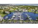 Aerial view of waterfront community with boat docks and luxury homes at 21321 Harborside Blvd, Port Charlotte, FL 33952