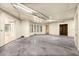 Unfinished basement area with high ceilings and large windows at 21321 Harborside Blvd, Port Charlotte, FL 33952