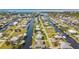 Stunning aerial perspective of waterfront properties with direct access to the water, ideal for boating enthusiasts at 24313 Pirate Harbor Blvd, Punta Gorda, FL 33955