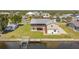 Charming home with a spacious yard, canal access, and a private dock, perfect for waterfront living at 24313 Pirate Harbor Blvd, Punta Gorda, FL 33955