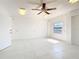 Spacious garage featuring bright lighting and an open floor plan at 24313 Pirate Harbor Blvd, Punta Gorda, FL 33955