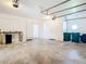 Garage with a large door for vehicles and additional storage space, plus access to the house at 24313 Pirate Harbor Blvd, Punta Gorda, FL 33955
