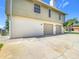 Two-car garage with an extended driveway at 24313 Pirate Harbor Blvd, Punta Gorda, FL 33955