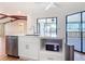 Kitchen island featuring stainless steel appliances and plenty of cabinet space at 24313 Pirate Harbor Blvd, Punta Gorda, FL 33955