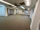 Bright office space with neutral carpet, drop ceiling with ceiling fans and natural light at 24313 Pirate Harbor Blvd, Punta Gorda, FL 33955