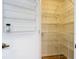 Walk in pantry with multiple wire shelves for optimal storage at 24313 Pirate Harbor Blvd, Punta Gorda, FL 33955