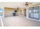 Open air porch with ceiling fans, outdoor grill, and access to waterfront views at 24313 Pirate Harbor Blvd, Punta Gorda, FL 33955