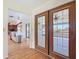 View of modern kitchen and outdoor deck with stainless steel appliances at 24313 Pirate Harbor Blvd, Punta Gorda, FL 33955