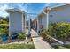Front entry with walkway, landscaping, and gated patio at 3300 Loveland Blvd # 1301, Punta Gorda, FL 33980