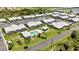 Aerial view of community pool and surrounding buildings at 3300 Loveland Blvd # 1301, Punta Gorda, FL 33980