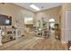 Bright dining room features a farmhouse table and kitchen views at 3300 Loveland Blvd # 1301, Punta Gorda, FL 33980