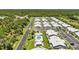 Aerial view showing community pool and surrounding homes at 3300 Loveland Blvd # 1301, Punta Gorda, FL 33980
