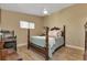 Bedroom with wood flooring and a post bed at 3300 Loveland Blvd # 1301, Punta Gorda, FL 33980