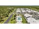Aerial view of community with pool and numerous houses at 3300 Loveland Blvd # 1301, Punta Gorda, FL 33980