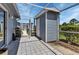 Screened patio with storage shed and tiled floor at 3300 Loveland Blvd # 1301, Punta Gorda, FL 33980
