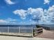 Peaceful waterfront view with pier and calm water at 1286 Hillcrest Nw Ave, Port Charlotte, FL 33948