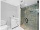 Bathroom with walk-in shower and white vanity at 1601 Park Beach Cir # 121/7, Punta Gorda, FL 33950
