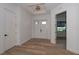 Bright and airy entryway with double doors and light flooring at 17594 Vellum Cir, Punta Gorda, FL 33955