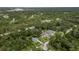 Aerial view of a house nestled in a residential neighborhood at 265 Tipton St, Port Charlotte, FL 33954