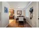 Dining area with table and chairs, kitchen partially visible at 265 Tipton St, Port Charlotte, FL 33954