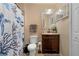 Bathroom with shower, toilet, and vanity with a granite top at 265 Tipton St, Port Charlotte, FL 33954