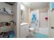 Bathroom with tub shower, vanity, and additional shelving at 265 Tipton St, Port Charlotte, FL 33954