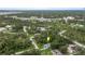 Aerial view of a house on a tree-lined street at 265 Tipton St, Port Charlotte, FL 33954